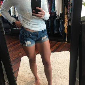 Low rise distressed Jean short